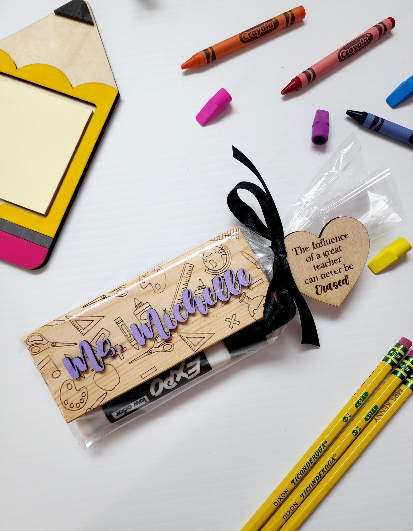 Sticky note holder and erasers bundle